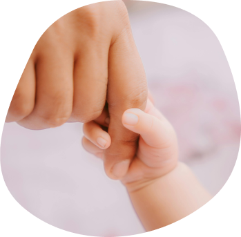 Mother and baby hand